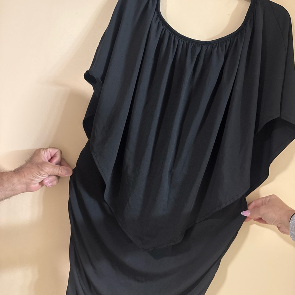 black off-shoulder draped dress or tunic top made of a light…#442